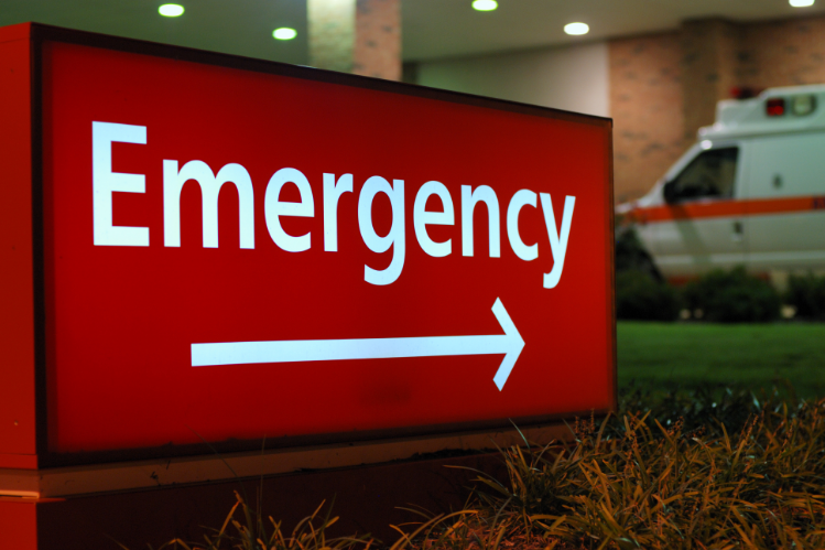  A sign with emergency written on it